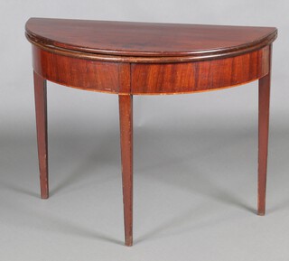 A 19th Century mahogany demi-lune tea table on square tapered supports 72cm h x 94cm w x 46cm d (top warped)