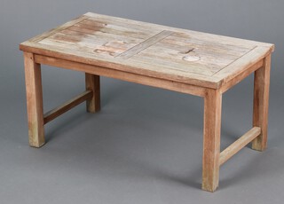 A slatted bleached hardwood garden table 45cm h x 90cm w x 50cm d 
