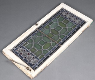 An Edwardian stained glass lead glazed window 100cm x 47cm (glass cracked)
