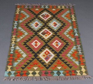 A green, black and white ground Maimana Kilim rug with all over diamond design 143cm x 94cm 