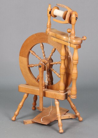 A beech framed spinning wheel by Ashford New Zealand 87cm h x 44cm w 