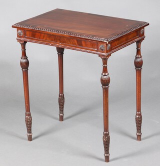 An Edwardian rectangular carved and crossbanded mahogany occasional table, raised on turned supports 67cm h x 60cm w x 40cm d 