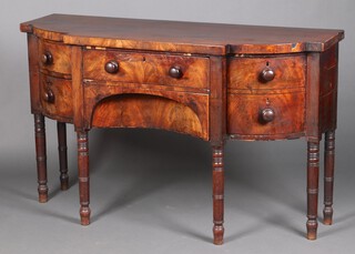 A Georgian mahogany breakfront sideboard fitted a drawer above secret drawer, flanked by a drawer and pot cupboard enclosed by a panelled door, raised on turned supports 91cm h x 152cm w x 54cm d 