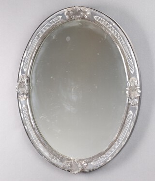A 19th Century "Irish" etched glass circular mirror with etched glass mounts 57cm  x 45cm 