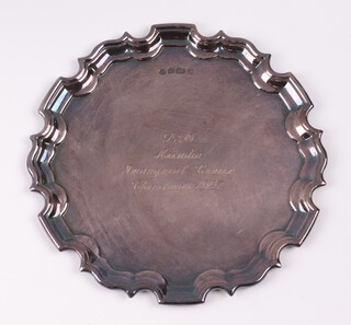 A silver salver with bracketed border and engraved inscription P & O Arcadia Inaugural Cruise Christmas 1997, Sheffield 1997, by Carr's, 12cm, 96 grams  