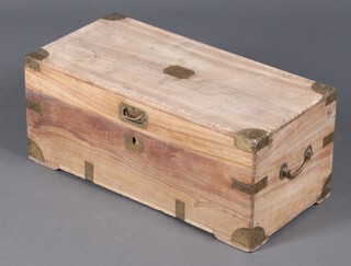 A 19th Century bleached camphor and brass banded trunk with hinged lid and brass drop handles 27cm h x 52cm w x 30cm d 