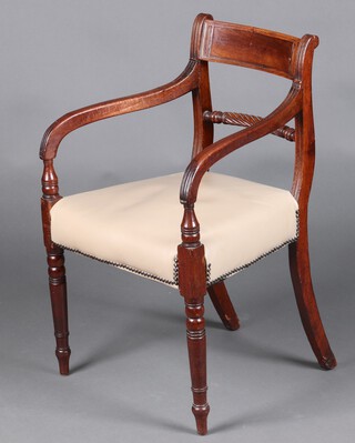 A 19th Century mahogany bar back open arm carver/desk chair, the seat upholstered in white leather 80cm h x 45cm w x 43cm d 