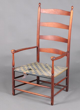 An Arts and Crafts beech framed ladder back open arm chair with woven fabric seat, raised on turned supports (formerly on casters) 104cm h x 60cm w x 66cm d 