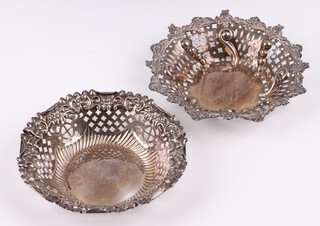 A pierced silver dish Chester 1895 by William Nanton, together with a pierced and embossed silver bowl Birmingham 1898 by Adie & Lovekin Ltd, 84 grams 