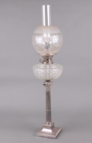 A cut glass oil lamp reservoir raised on a silver plated Corinthian column capital candlestick, converted to an oil lamp, complete with opaque glass shade 42cm 