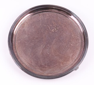 A silver salver on panel supports Sheffield 1987 by Robert Belk Ltd., 15cm, 154 grams 