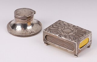 A rectangular Edwardian embossed silver matchbox on bun feet, Birmingham 1900 21 grams, together with a silver capstan inkwell Birmingham 1927 4cm x 6cm (dents throughout, inkwell missing) 