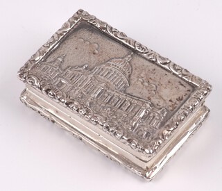 A rectangular silver pill box, the lid decorated St Paul's Cathedral, London 2002, 60 grams 