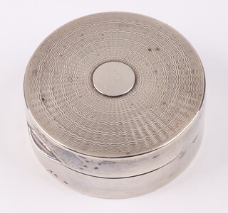 A silver powder box with mirrored interior, London 1901 by S J Rose & Sons, 5cm, gross weight 50 grams 