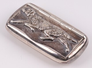 A 925 rectangular silver snuff box, the lid embossed a running dog, the base marked MC & SA, 33 grams 