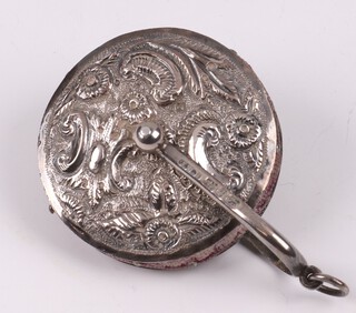 A Victorian embossed silver pin cushion, Birmingham 1888 by John Milward Banks, 3.5cm 