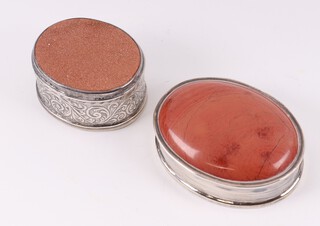 A 20th Century Continental 925 silver pill box the lid inlaid a cabochon cut hardstone 4cm and  1 other 3cm, gross weight 43 grams 