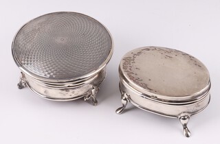 An Edwardian silver trinket box with hinged lid on panel supports, Birmingham 1908 by Levi & Salaman, 6cm, 24 grams and 1 other by William Gill of London (marks rubbed) 7cm, gross weight 44 grams 