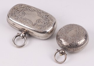 A rectangular silver double sovereign case Birmingham 1908 (some dents) together with a circular silver sovereign case Birmingham 1890, gross weight 41 grams 