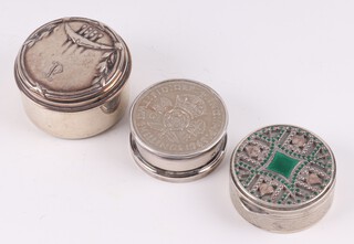 A silver sided trinket box London 1996, the top and bottom set a 1948 2 shilling piece, together with a Continental circular 900 silver and enamelled pill box 3cm and an 800 standard silver box 