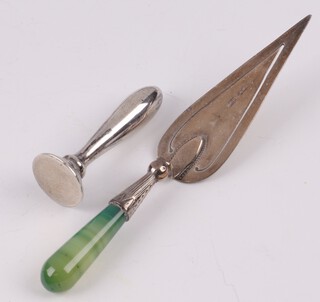 An Edwardian silver seal Birmingham 1911 3 grams, together with a marked silver bookmark in the form of a trowel with turned hardstone handle 