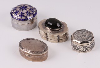 A shaped 925 silver trinket box set a cabochon green hardstone 3cm, a 925 silver box with blue enamelled lid 2cm, an octagonal 925 silver box 2cm and 1 other 3cm 