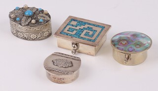 A rectangular Mexican 925 silver and blue enamelled trinket box with hinged lid 4cm, circular ditto with mother of pearl lid 3cm, an Israeli arch shaped box with hinged lid 3cm and an oval box set turquoise 3cm 