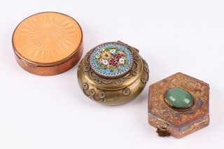 A circular gilt metal pill box the lid with floral micro mosaic panel 3cm, ditto compact with peach guilloche enamelled lid, the interior marked gold cased 4cm, a hexagonal gilt metal box set a cabochon cut stone 4cm (hinge a/f)
