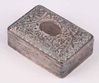 An Eastern embossed white metal trinket box with hinged lid 3cm x 8cm x 5cm 