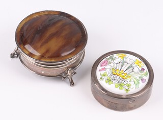 A silver and tortoiseshell effect trinket box with hinged lid on panel supports 6cm, Birmingham 1924, marks rubbed, gross weight 69 grams, together with a limited edition Prince of Wales and Lady Diana Spencer silver pill box and cover with porcelain panel to the centre decorated The Prince of Wales Feathers London 1981  5cm  gross weight 59 grams 