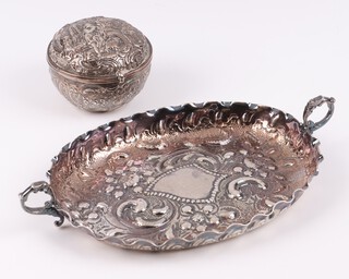 A Victorian oval embossed silver twin handled dish Sheffield 1890 by Henry Atkin, together with an embossed Continental silver trinket box with import marks, the lid decorated a classical scene, 107 grams 