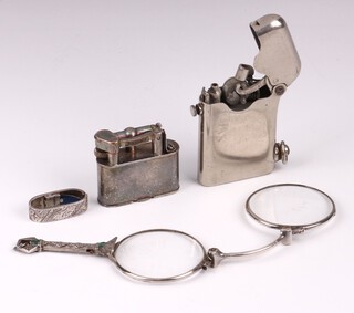 A pair of lorgnettes marked 935, a Dunhill silver plated later no.143752 2cm, a Thorne's Swiss Made lighter (a/f) and a metal clip 