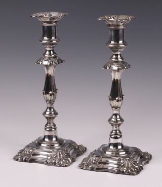 A pair of Elkington Rococo style silver plated candlesticks with detachable sconces 26cm 