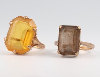 Two 9ct yellow gold gem set dress rings, size N, 10.3 grams gross 