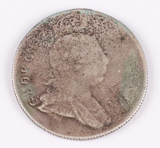 An 1809 sterling silver 3 Guilder coin for Essequibo and Demerary (now Guyana). Previously mounted. KM8