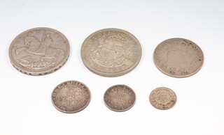A collection of mainly pre 1947 coinage to include a George VI 1937 crown, George V 1935 Silver Jubilee crown, a Victorian 1890 half crown, a Victorian 1895 shilling, a Victorian sixpence and a George V thruppence 