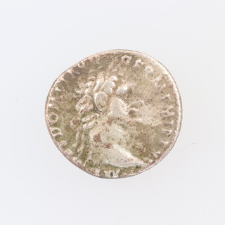 Roman Empire, Domitian silver denarius coin, obv, laureate head (r), rev Minerva (r) holding javelin and shield, Rome 94AD (RIC712)