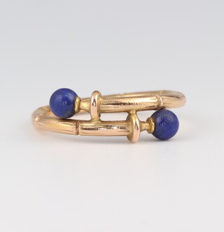 A 19th Century yellow gold, testing as 18ct dress ring set 2 blue hardstones, size L, 3.7 grams 