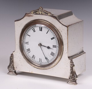 C Fexacta, a French Art Deco 8 day timepiece with 9cm dial, contained in an arch shaped silver plated case, complete with key 15cm x 7cm 