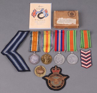 A pair of medals comprising British War medal and Victory medal to 215824 Private R J Clinick Labour Corp, together with a pair Defence and War medal attributable to A Chastey of Bostock Avenue, Horsham, an RAF blazer badge and a small collection of cloth insignia 