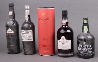 A 750ml bottle of Quinta do Passadouro Porto vintage 1998, together with a 75cl bottle of Graham's aged 10 years Tawny Port, a 75cl bottle of Porto Dobson and a 75cl bottle of Dow's Trademark Finest Reserve Port 