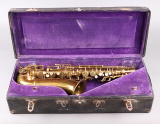 Charles E Forte Ltd., a French brass saxophone no.1823 complete with carrying case 