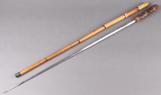 A Victorian double bladed sword stick 68cm with a bamboo sheath 