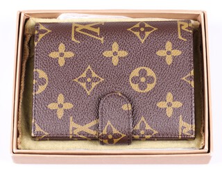 A Louis Vuitton wallet 9cm x 11cm with original box 
