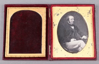 An early portrait photograph of a gentleman 9cm x 7cm oval  
