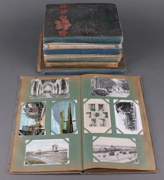 A collection of 6 late Victorian and early to mid 20th Century postcard and photo albums depicting scenes from Sussex including Horsham, Surrey, South Africa and The Netherlands as well as coloured postcards and greetings cards 