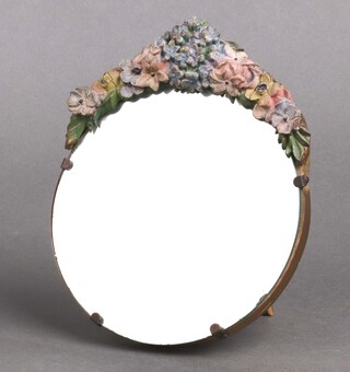 A 1930's circular bevelled plate easel mirror with barbola mounts 18cm diam. 