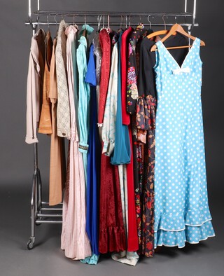 A collection of 1950's - 1970's vintage clothing including 3 dresses by Chresta, a Berketex dress, a Frank Usher dress, a Triumph velour dressing gown, Franco di Tardo skirt, Quad dress, Tricosa 3 piece set (jacket, sleeveless top and skirt), Cordoba Suedewear, London, tan suede waistcoat, a Wolsey Lombadri 2 piece wool suit (moth damage), 5 other dresses, a 2 pie dress et and a skirt, sizes 10 - 16