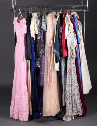 A collection of Vintage clothing including a Chresta Couture dress, a Harrods spotted dress, a Travers Tempos dress, a blue nurses uniform dress with British Red Cross badge, a cream wedding dress/ball gown, a Chresta jacket and one other and five other assorted dresses, sizes 10-14