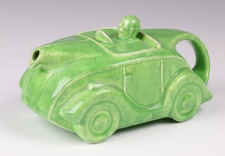 An Art Deco Sadler Pottery green glazed teapot in the form of a motorcar, 23cm (chip to lid) 